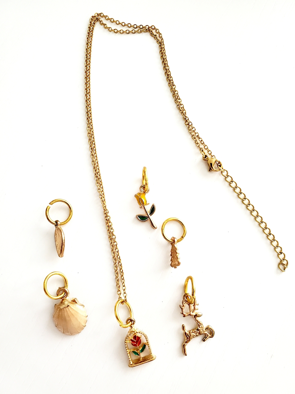 Gold-Tone Necklace with Red Rose and Five Other Charms